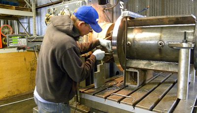 Industrial water pump being serviced and repaired